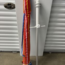 Beach/Outdoor umbrella and special screw anchor for installation  Like NEW