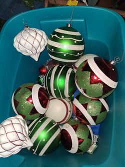 12 large holiday balls and lots of regular size