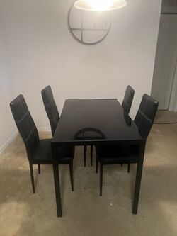 Dining Set (includes 4 chairs)
