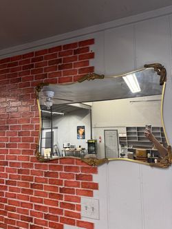 Vintage gold ornate wall mirror