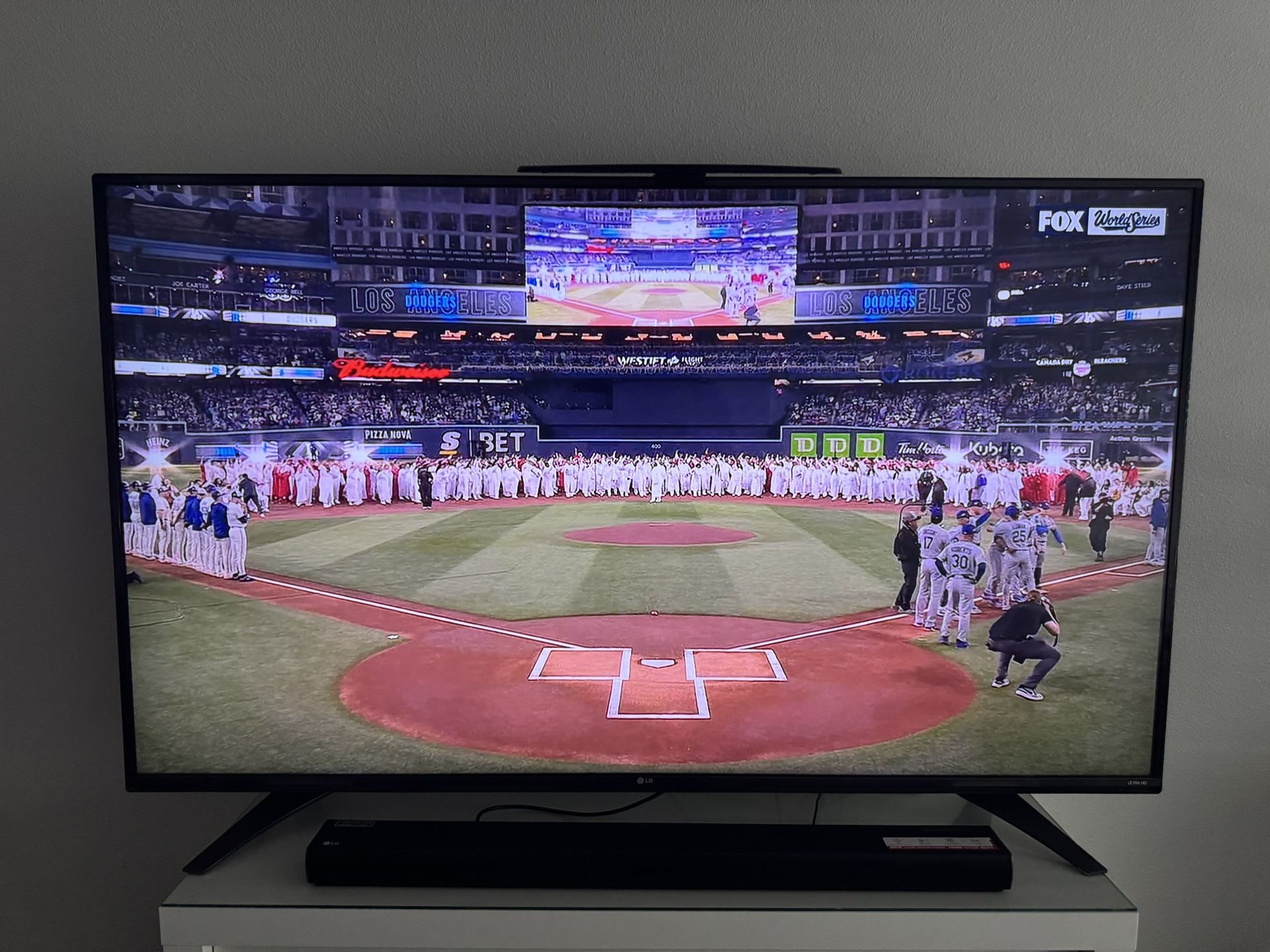 LG TV, Soundbar, And Subwoofer