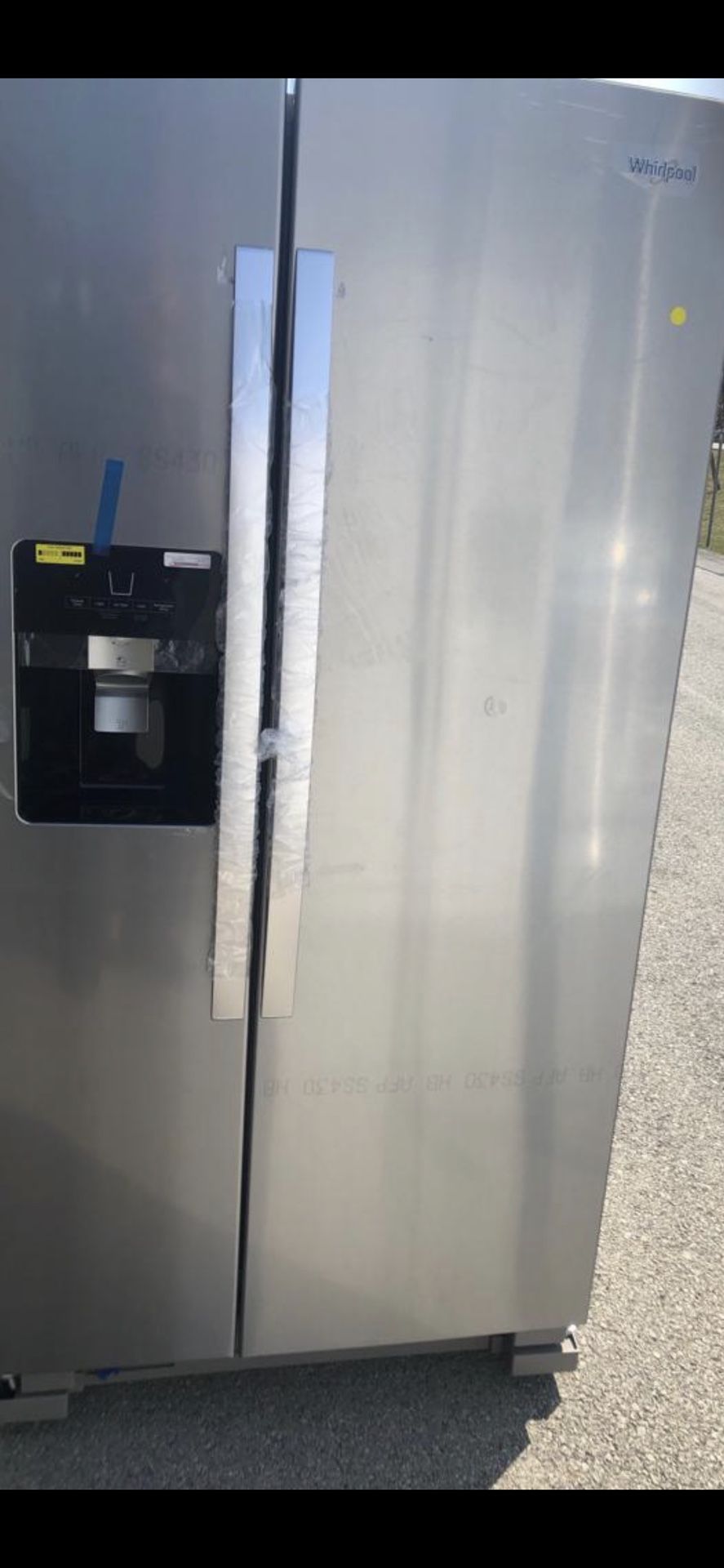Brand new whirlpool stainless steel side by side