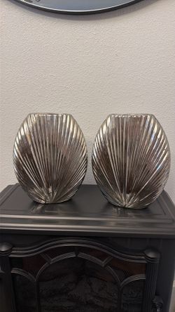Two silver vases