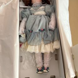 Monique 27 inch Porcelain doll New in the box