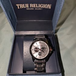 Brand new silver Men's True Religion watch.
New