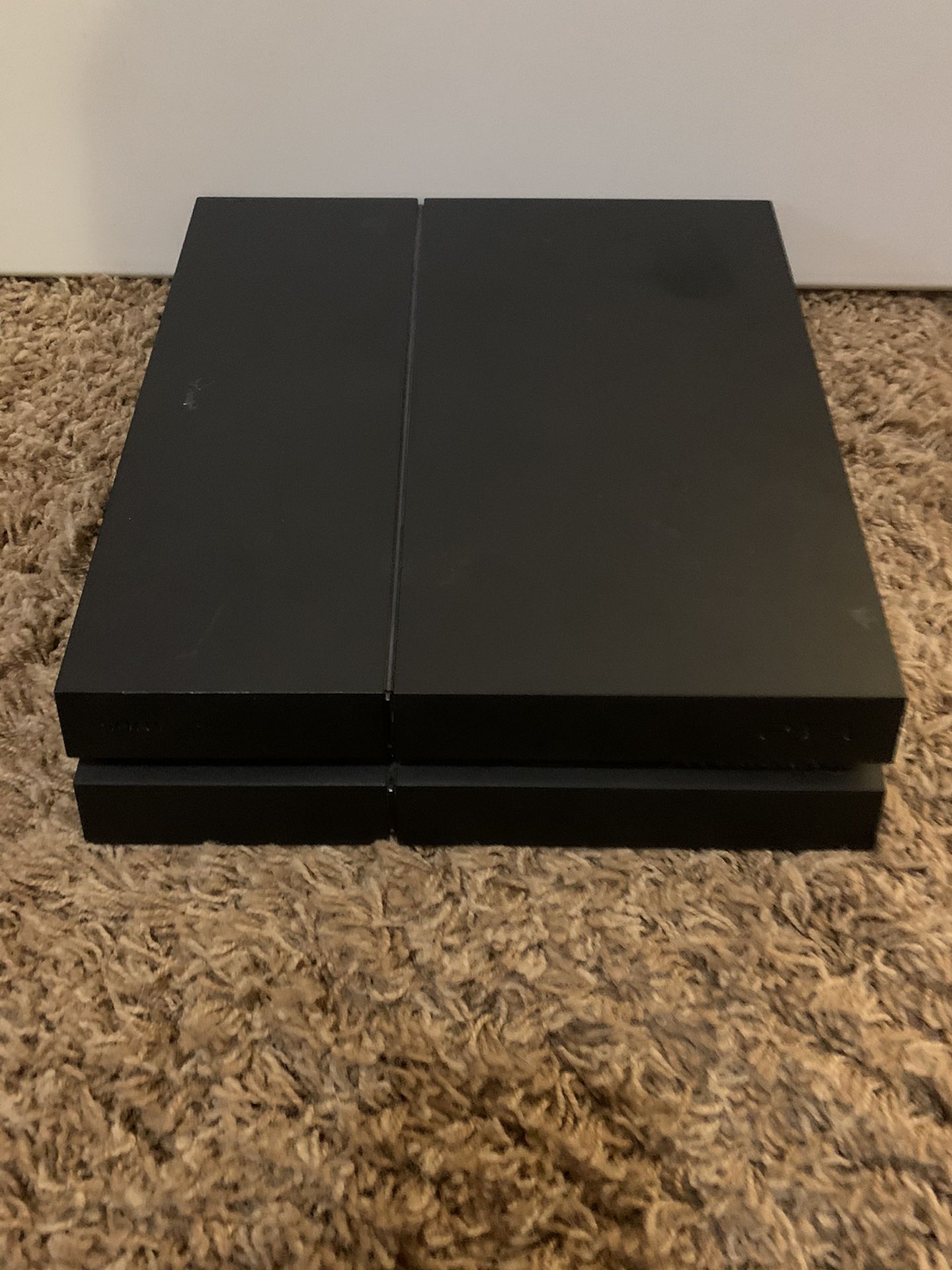 PS4 with 2 controllers and games