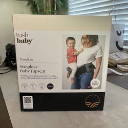 Tush Baby carrier Never Used. Brand New With Tags. 