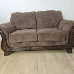 Like new brown Montgomery Loveseat/ Sofa