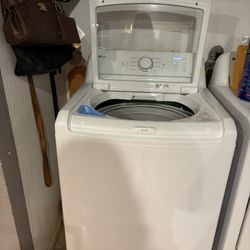 LG 5.0 cu. ft. Top load washer + 7.3 cu. ft. Vented dryer electric