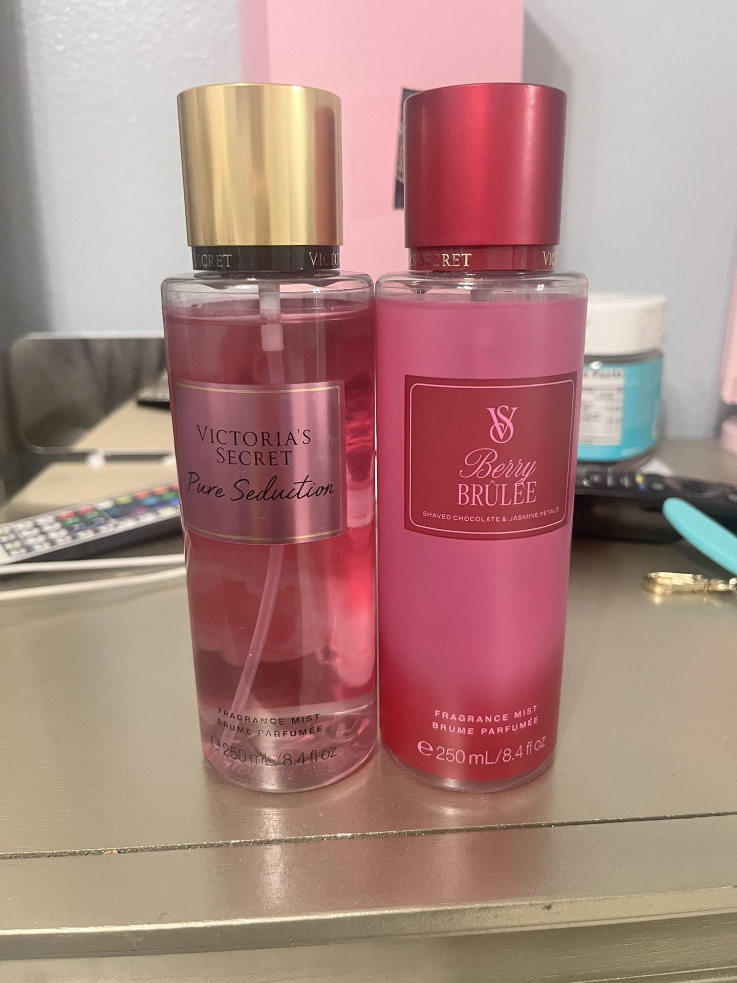2 Victoria secret perfumes (pure seduction and berry brulle)