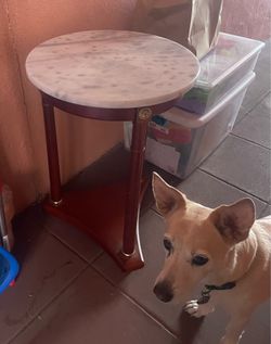 Solid wooden table with marble top
