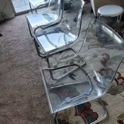Set Of 4 Clear Chairs