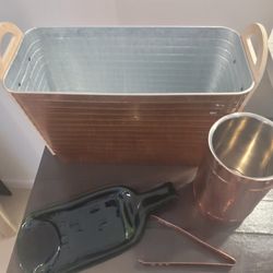 cooler, plus a beverage container and a glass bottle ornament.