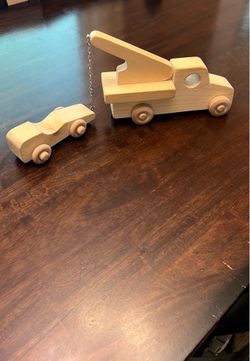 Handmade wooden tow truck and tow car