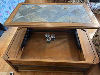 Coffee table lift top with storage