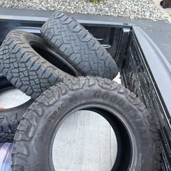 (4) USED GOODYEAR WRANGLER TIRES (KEVLAR REINFORCED)