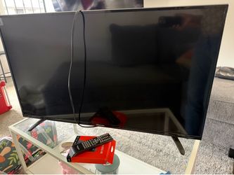 Hisense TV and remote,  and fire TV stick 4K bundle