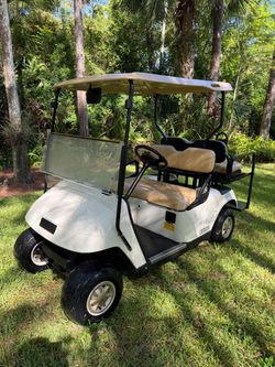 48 VOLT EZGO GOLF CART 4 SEATER!! RUNS AND DRIVES GREAT!