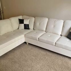 White Leather Sectional Couch And Ottoman