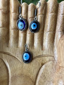 Protective eye earrings and pendant 