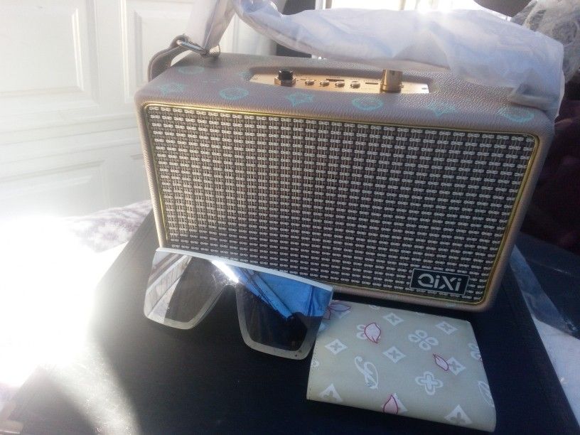 Qiki Bluetooth Portable Speaker
