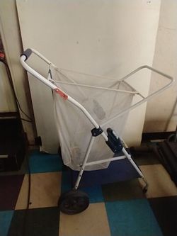 White foldable clothes hamper with mesh bag and wheels.   Tap on profile pic to see more items