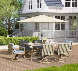 Sunset Retreat 7-Piece Aluminum Outdoor Dining Set with Swivel Chairs and Blue Cushions