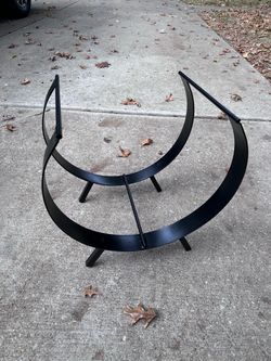 Custom made solid steel decorative firewood rack