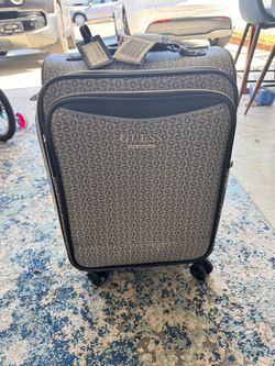 Guess carry on luggage