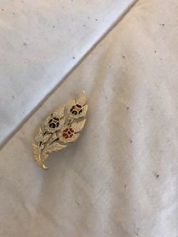 Broche metálico