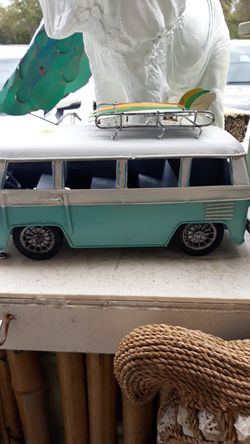 Tabletop VW bus with surfboards on top
