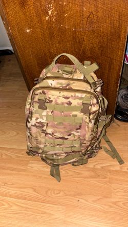 tactical multi-cam military-style 3-day assault backpack featuring MOLLE webbing