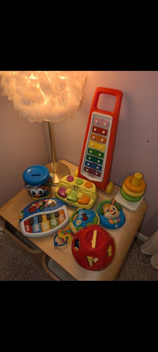 educational sensory and tactile baby Einstein games selling for $30.
