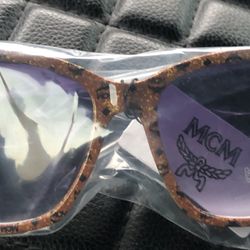 M.  C…..M.   sunglasses Black/brown/good