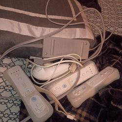 Three Wii Controllers And The Plug For The Console No Console