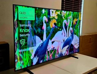 New 65 Inch Qled Q8F Samsung Smart TV 4K UHD with 144 Hz refresh rate.
