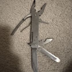 Multitool with Premium Replaceable Wire Cutters and Saw, Stainless