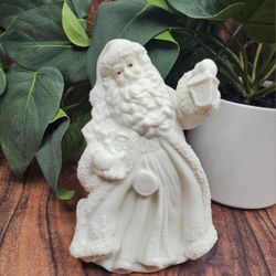 K Collection Ivory White snowy Glitter Porcelain Santa Claus With lantern figurine holiday decor. approximately 6"h x 4"l x 3"w *C