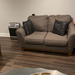 Excellent Condition 3 Piece Sofa With Center Table 2 Loveseat , And 1 Sofa And Beautiful Silver Table It’s Very Elegant And Modern Look