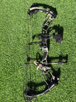 PSE Bow with Camo Finish and Accessories