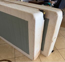 Free Used box springs for a king bed or 2 twin xl