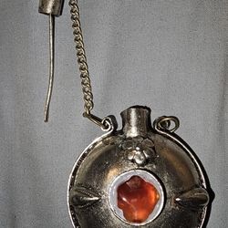 Vintage Metal Silver Colored Pendant That Holds Perfume