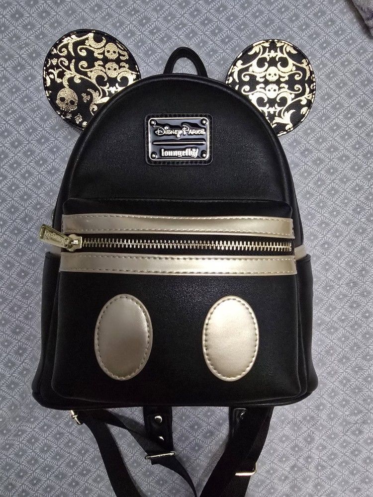 Loungefly Disney Parks Pirates of the Caribbean Mickey Mouse mini backpack. 