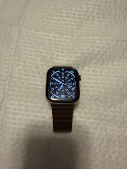 Apple titanium watch with $400 gold bracket like new