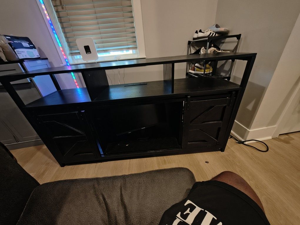 Tv entertainment Stand With Barn Doors And Powerstrip