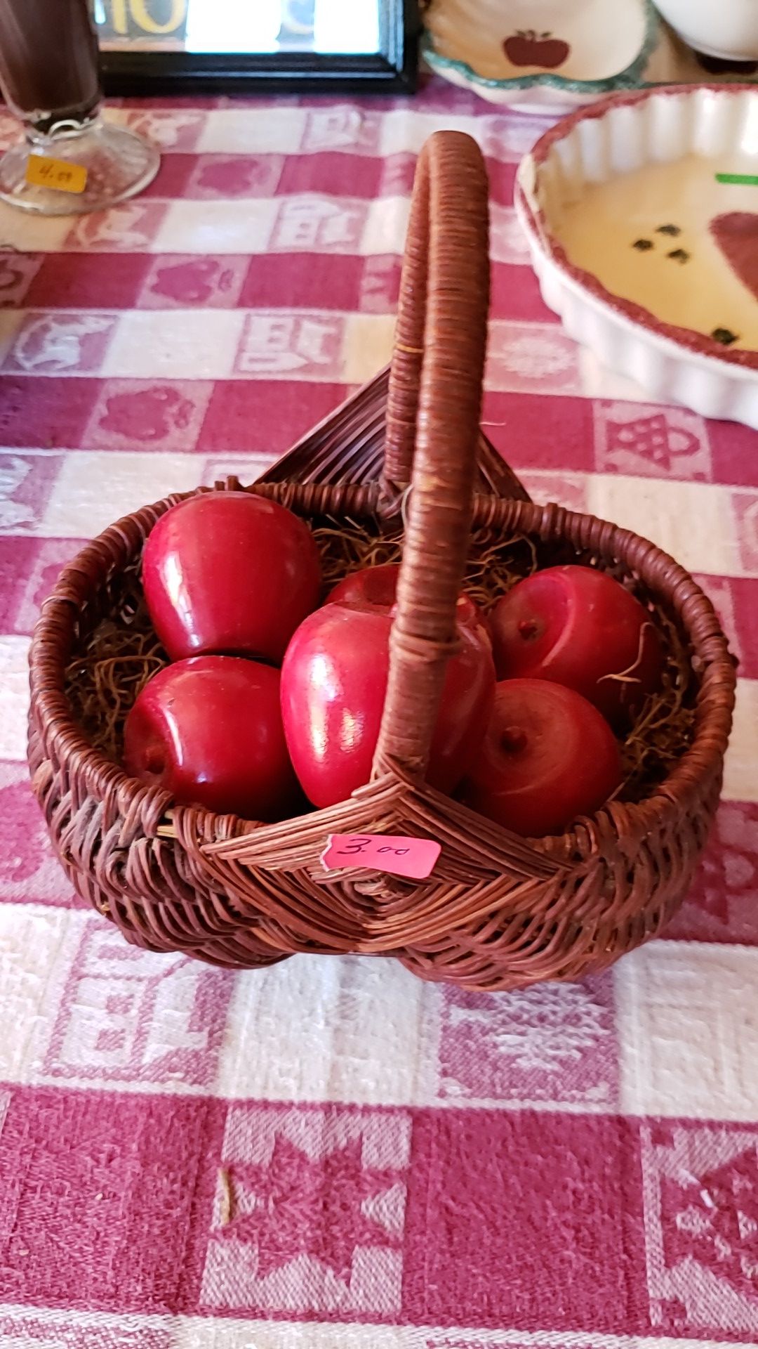 Basket with wooden apples