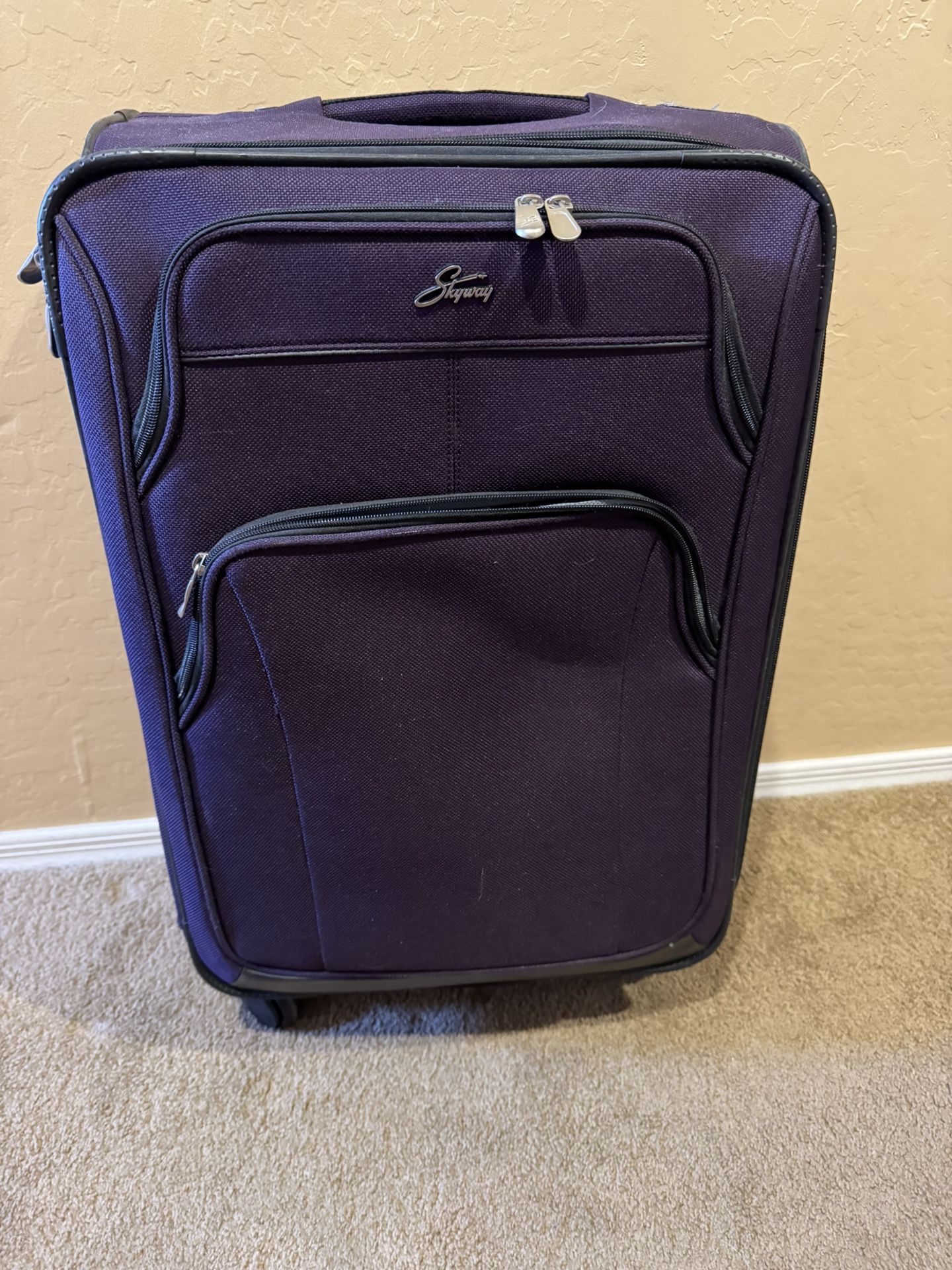 Skyway Purple Suitcase
