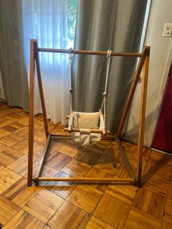 Wooden baby and toddler swing