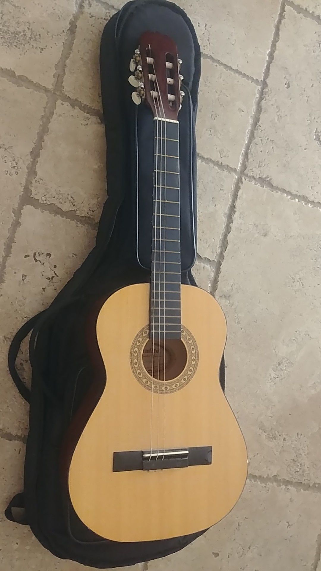 Small guitar with bag And Tamborine