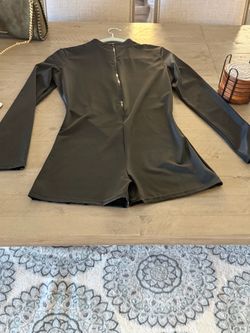 Woman’s Halloween costume: Body suit and Pantyhose